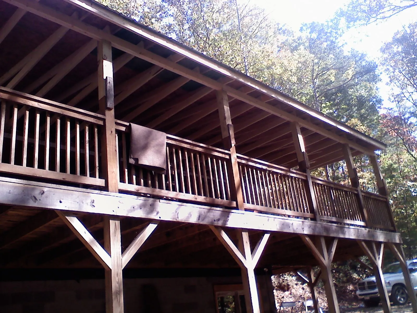 Timber framing under a new elevated porch and deck — Roof Leak Repair in Malin by Roofing Brothers